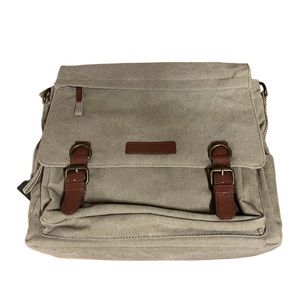 Kelly Moore bag NWT. Includes removable storage. Crossbody strap NOT included.